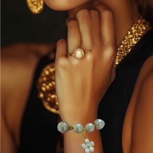 Elegant Gold and Pearl Bracelet with Floral  Charm